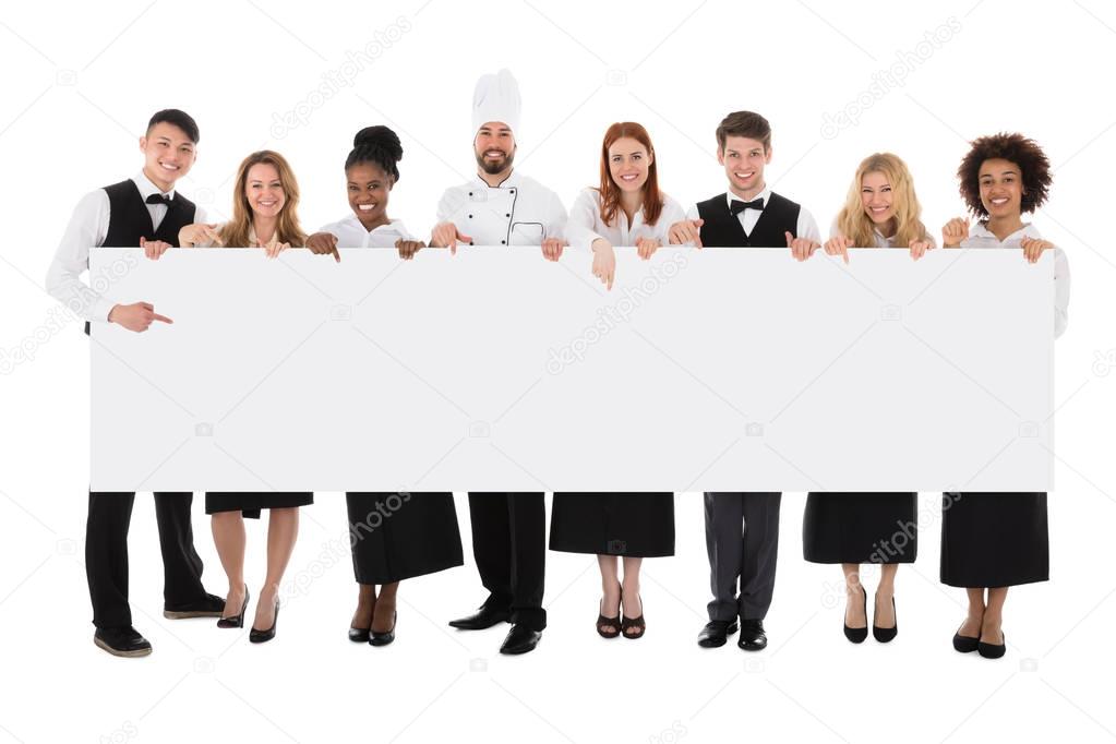 Multiracial People Holding Banner