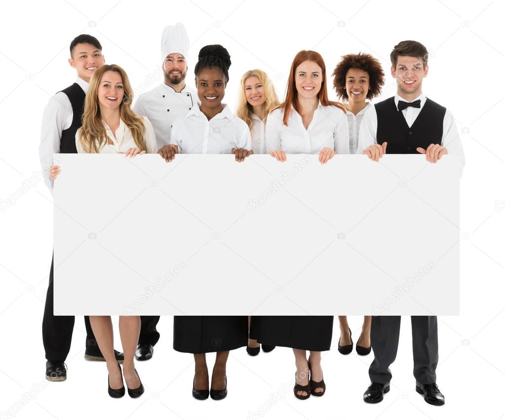 Multiracial People Holding Banner