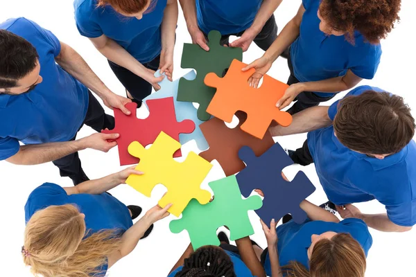 Group Of People Holding Puzzles — Stock Photo, Image