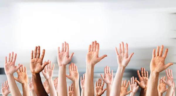 Photo Of Crowd Raising Hands High Up