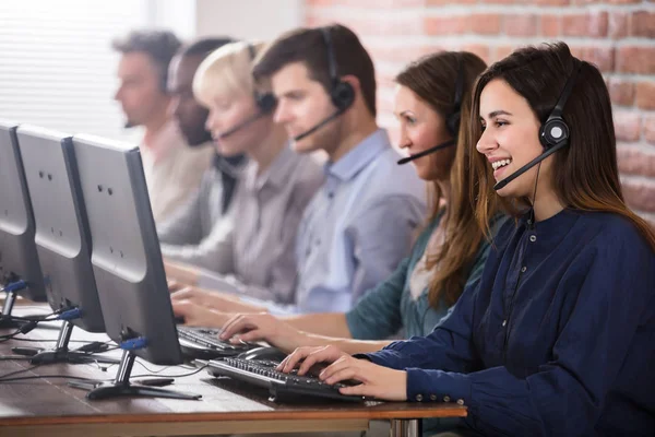 Positive Female Customer Services Agent Headset Working Call Center — Stock Photo, Image