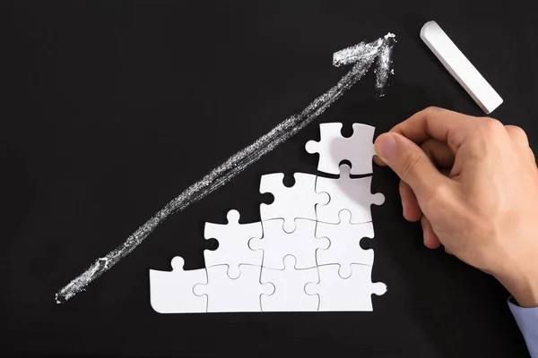 Person Arranging Puzzles — Stock Photo, Image