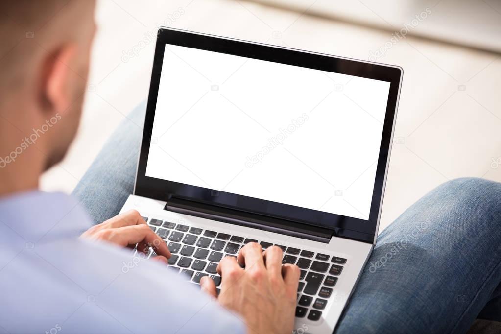 Person Working On Laptop