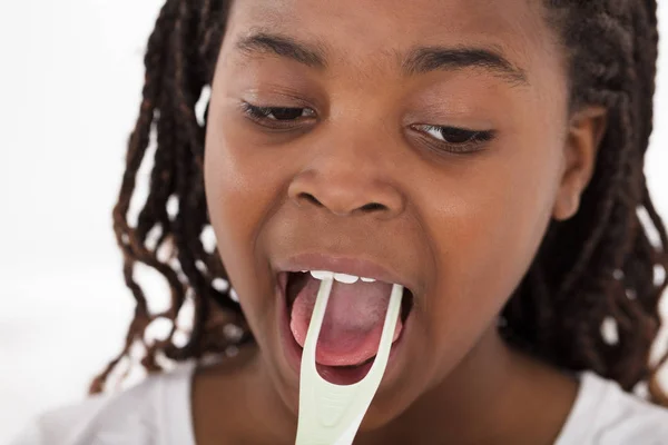Girl Cleaning Her Tongue — Stock Photo, Image