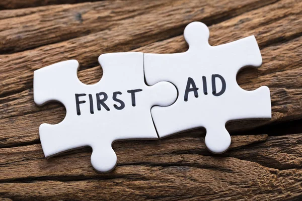 Connected First Aid Jigsaw Pieces — Stock Photo, Image