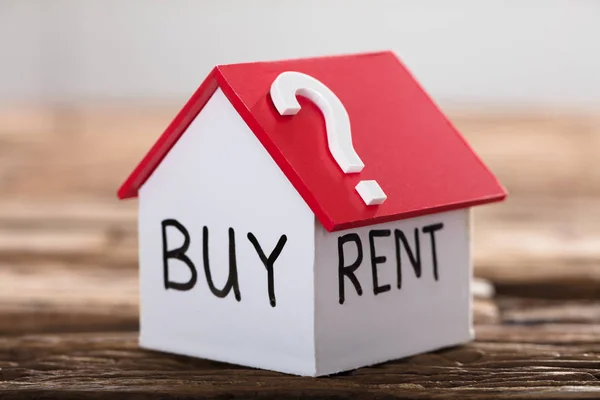 Buy Or Rent Text On Model House — Stock Photo, Image