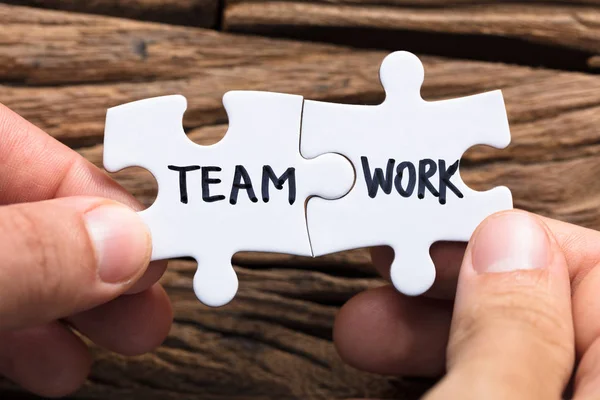 Connecting Team Work Jigsaw Pieces