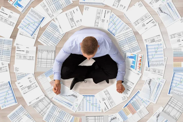 Businessman Surrounded With Documents — Stock Photo, Image