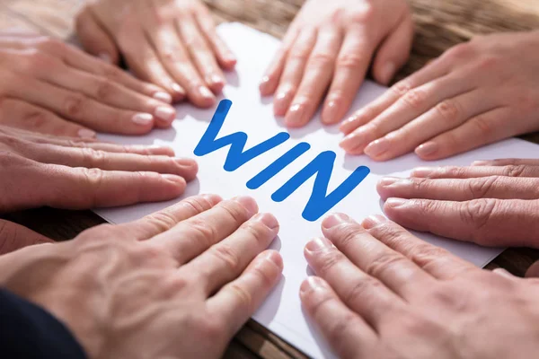 Elevated View Hands Touching White Paper Written Text Win — Stock Photo, Image