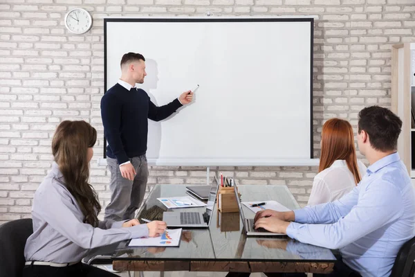 Businessman Giving Presentation His Colleagues Business Meeting — Stock Photo, Image