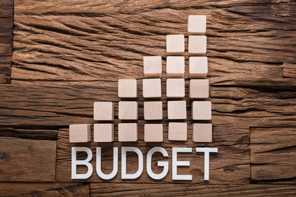 Budget Text genom att öka Bar — Stockfoto