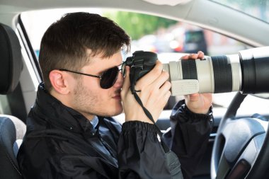 Özel Dedektif fotoğraf makinesi ile fotoğraf çekimi