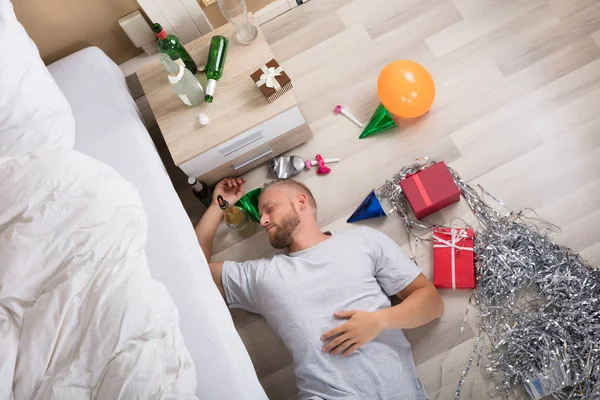 Man Sleeping On Hardwood Floor — Stock Photo, Image