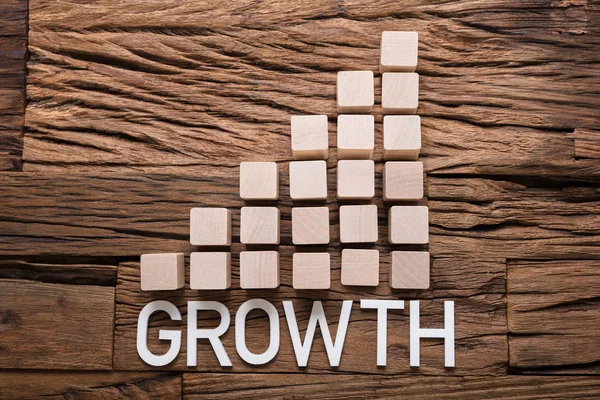 Growth Text By Increasing Bar — Stock Photo, Image
