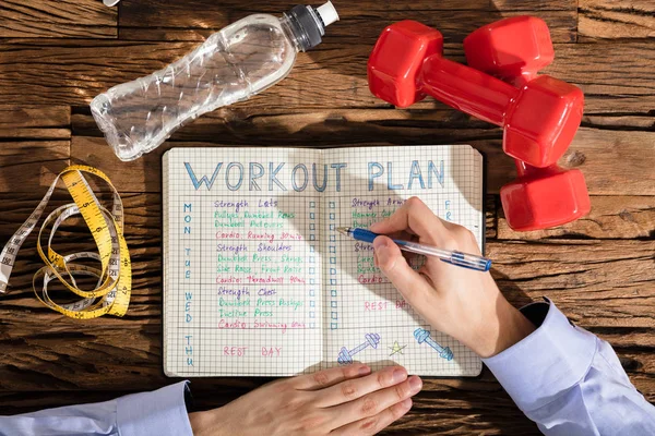 Person Making Workout Plan