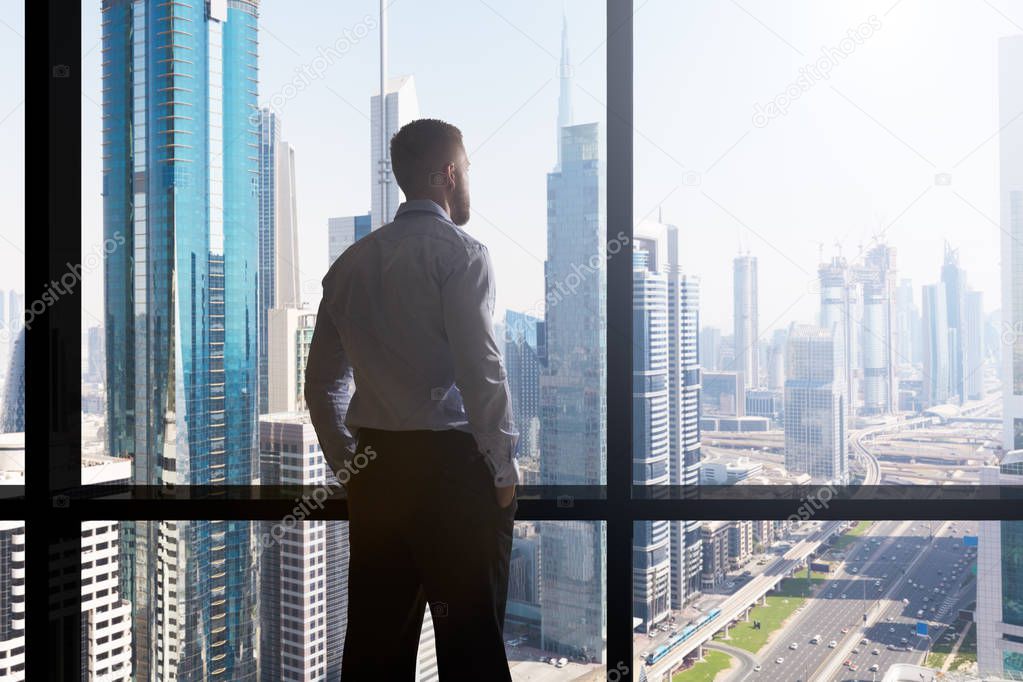 Businessman Looking At Cityscape