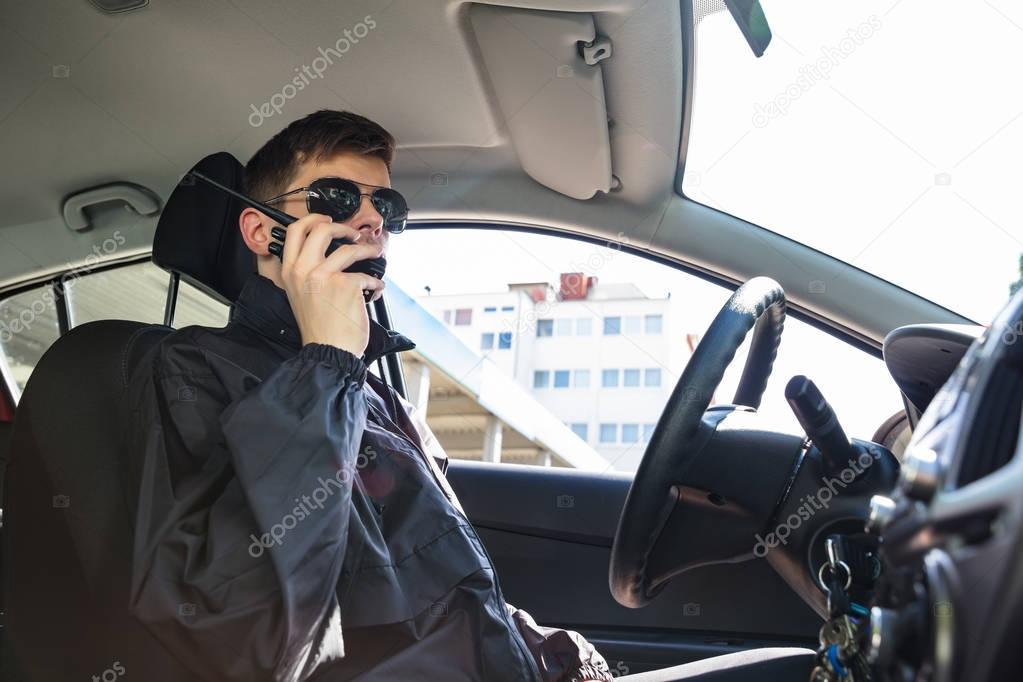 Detective Sitting Inside Car