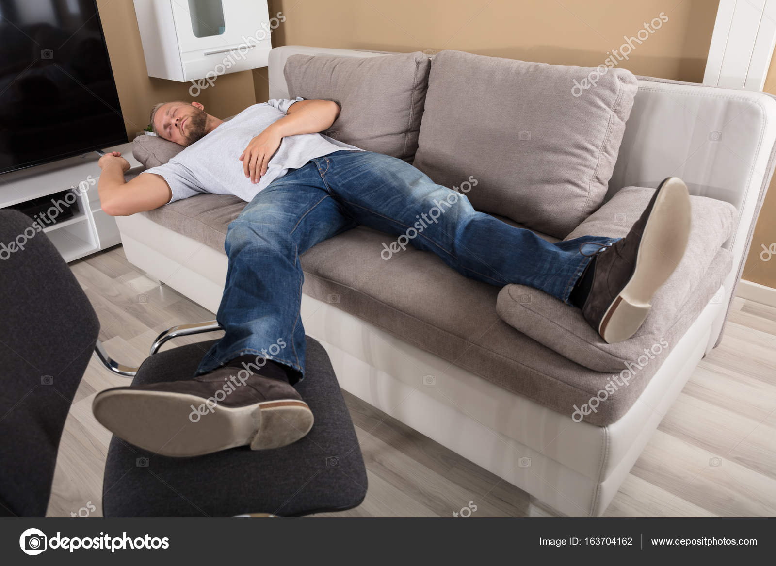 depositphotos_163704162-stock-photo-man-sleeping-on-couch.jpg