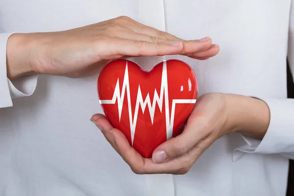 Person Protecting Heart With Pulse — Stock Photo, Image