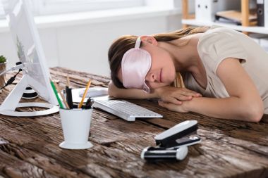 Woman Sleeping On Office Desk clipart