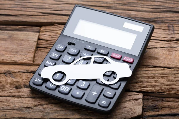 Carro de papel na calculadora — Fotografia de Stock