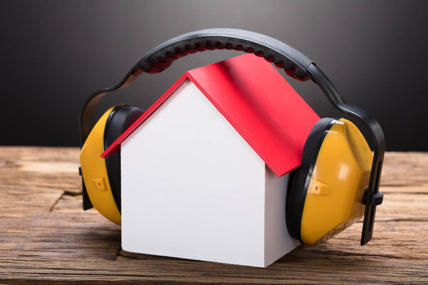 Model Home With Ear Protectors 