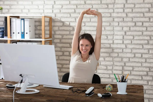 Businesswoman Stretching Arms — Stock Photo, Image