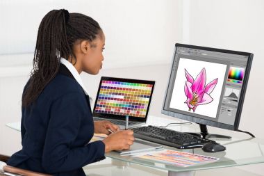 Female Designer Drawing Flower  clipart