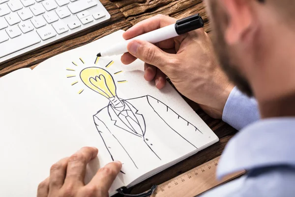 Businessman Drawing Person — Stock Photo, Image