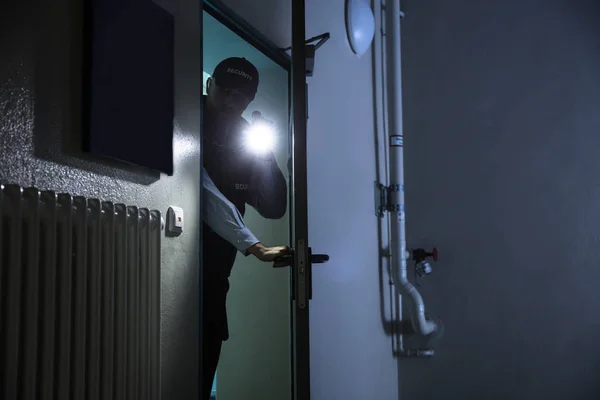 Security Guard With Flashlight — Stock Photo, Image