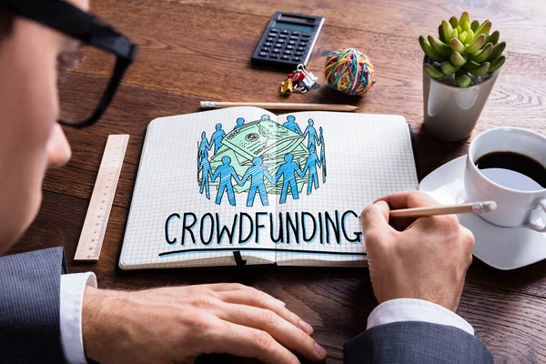 Man Drawing Crowdfunding Concept — Stock Photo, Image