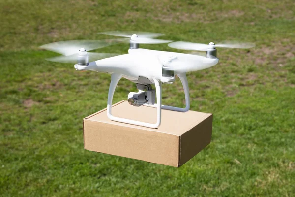 Drone carrying parcel