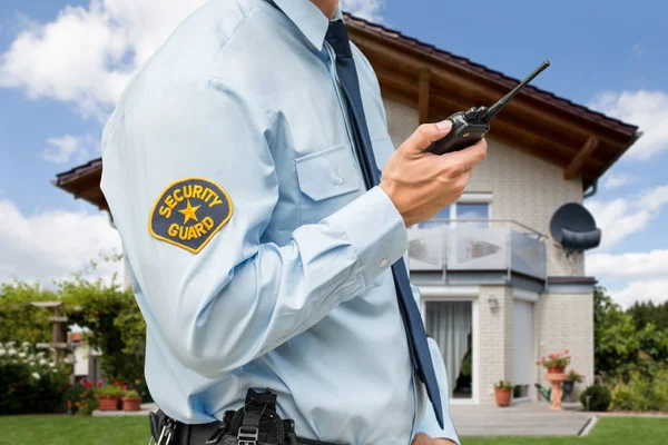 Close Security Guard Standing Front House Holding Walkie Talkie — Stock Photo, Image