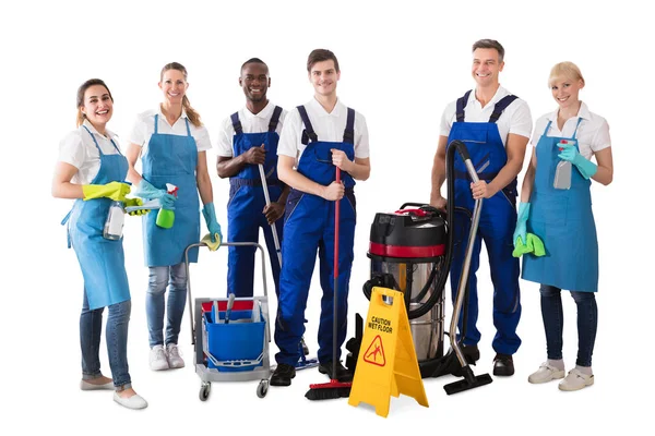 Portrait Happy Multiethnic Janitors Holding Cleaning Equipment White Background — Stock Photo, Image