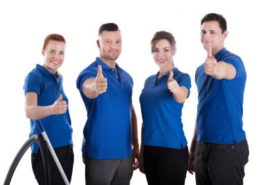 Mutlu Janitors başparmak tabela beyaz arka plan karşı gösterilen portresi