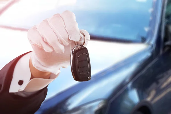 Valet Boy Holding Car Key