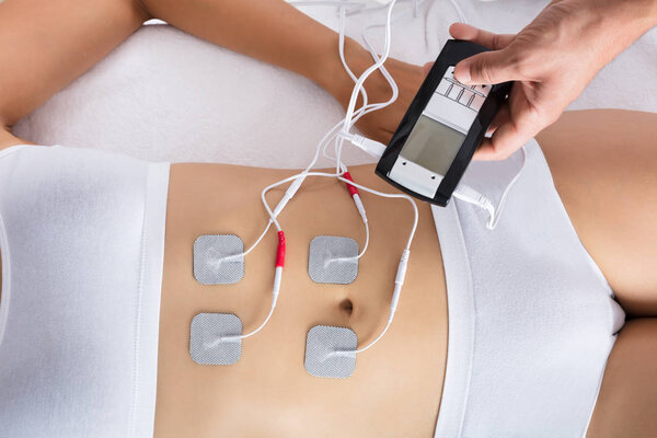 Therapist Giving Electrodes Therapy 