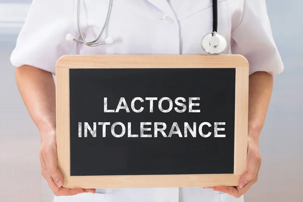 Arts met tekst Lactose-intolerantie — Stockfoto