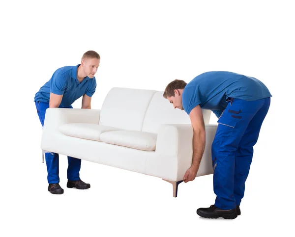 Movers Placing Sofa — Stock Photo, Image