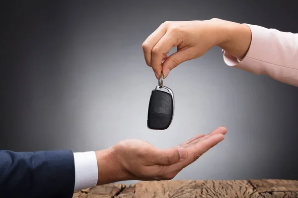 Dealer Giving Key — Stock Photo, Image