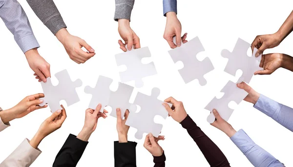 Hands Holding Jigsaw Puzzles — Stock Photo, Image