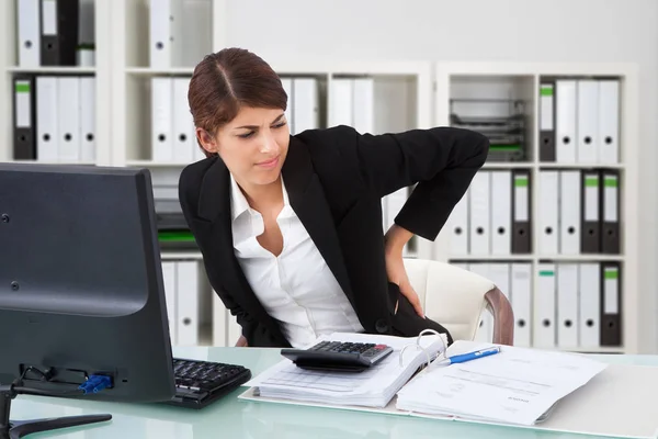 Businesswoman Suffering From Back Pain — Stock Photo, Image