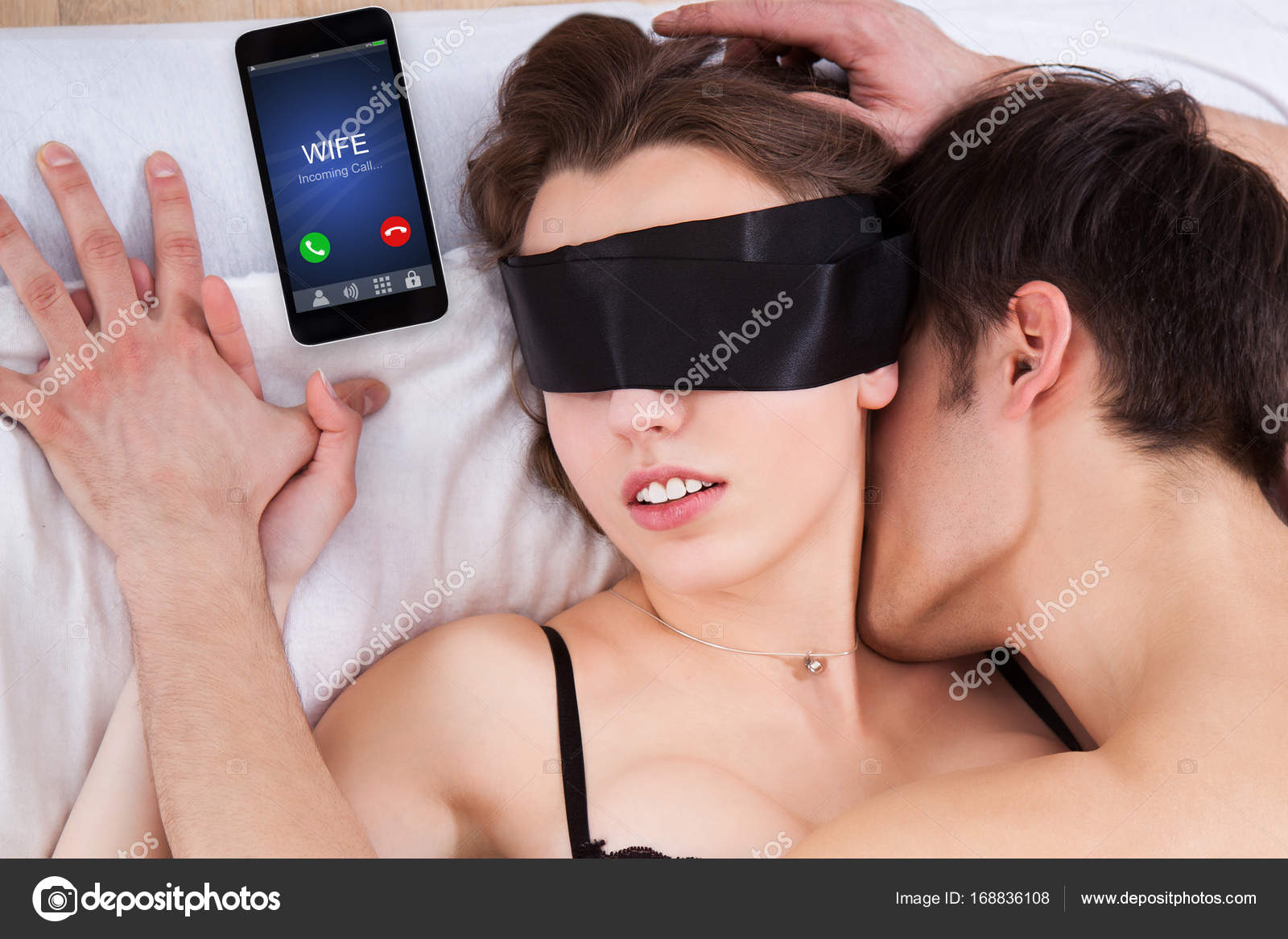 Man In Bed With Blindfolded Woman Stock Photo by ©AndreyPopov 168836108 photo