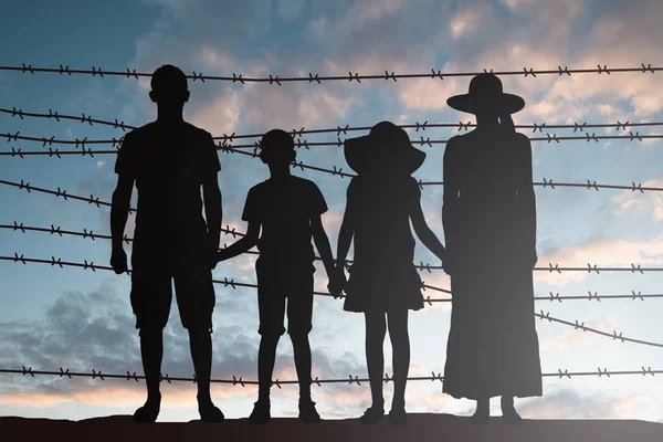Silhouette Refugee Family Standing Fence — Stock Photo, Image