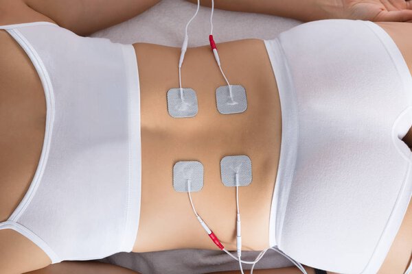 Woman Lying With Electrodes 