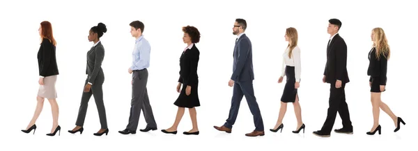 Businesspeople Walking In Line Stock Photo