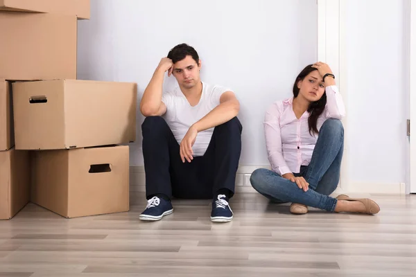 Tired Couple Near Boxes — Stock Photo, Image