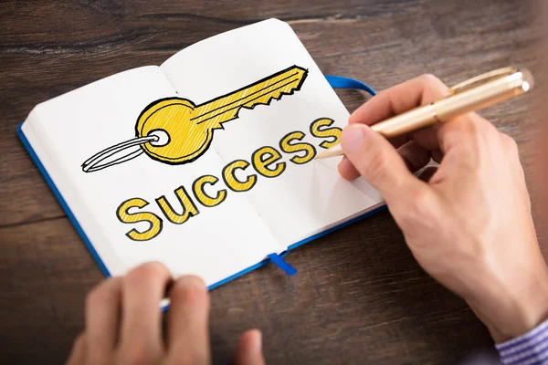 Person Drawing Success Key