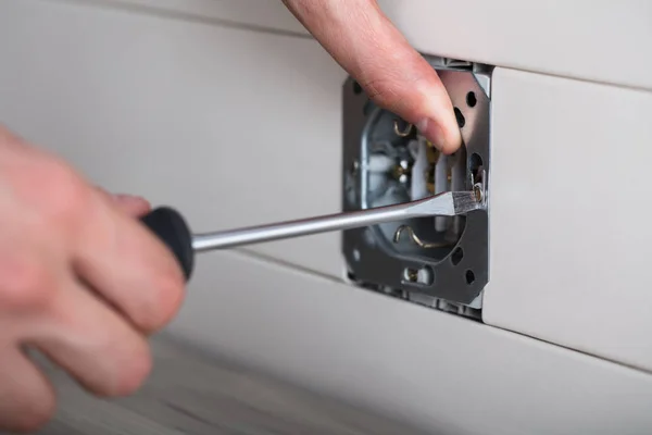 Person Repairing Electrical Socket — Stock Photo, Image