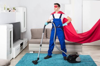 Süper kahraman Kapıcı ile elektrikli süpürge 